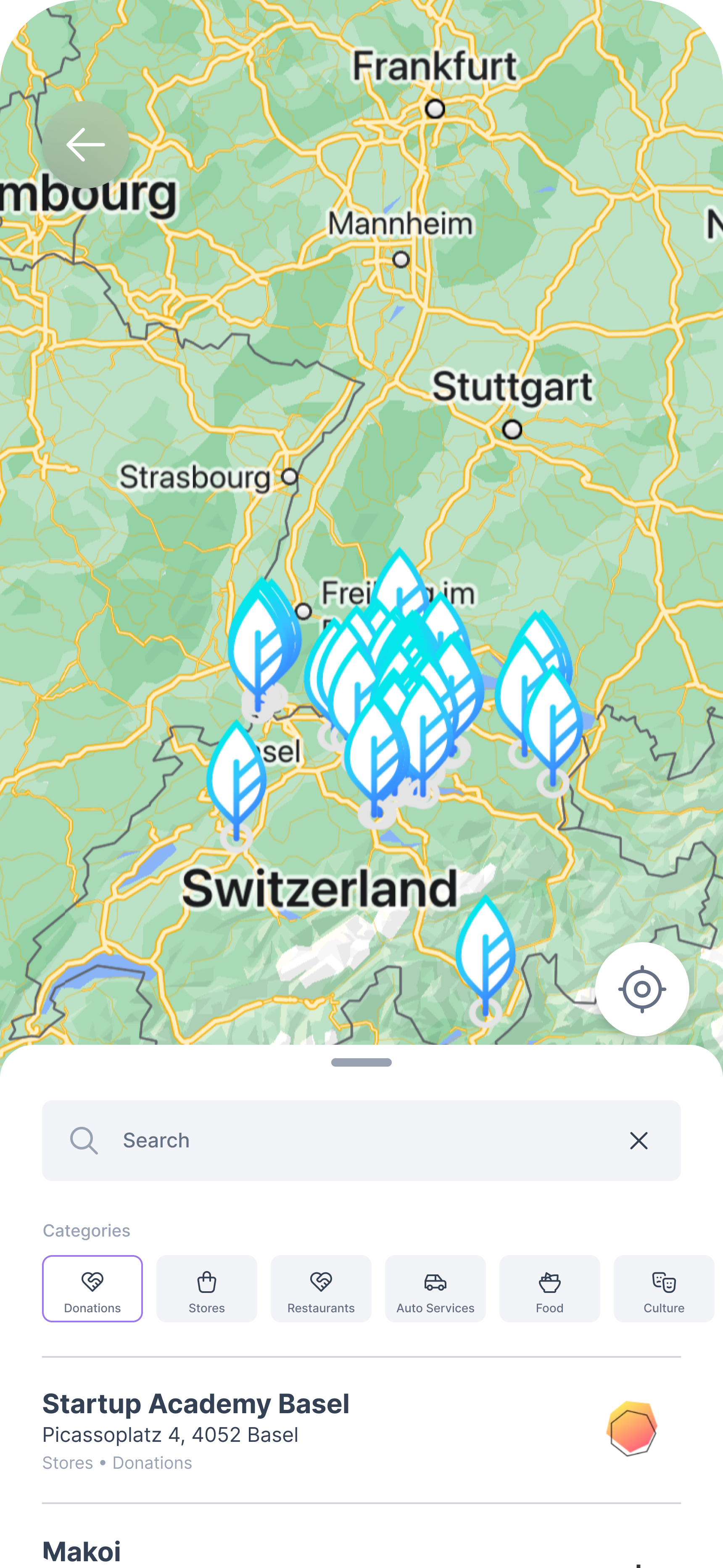 The app map showing participating businesses and category filters.